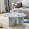 A Multi-style Decor Friendly MDF White Round Coffee Table, Featuring Modern Minimalism and Nordic Flair, with Dimensions of 31.5*31.5*13.98 Inches.